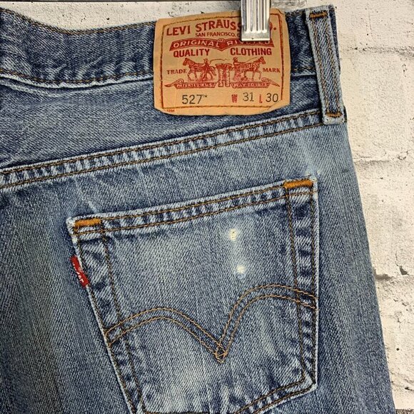 Levi's 527 Low Boot Cut Distressed Denim Jeans - Picture 4 of 16